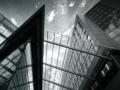 Canva - Grayscale of Glass Building